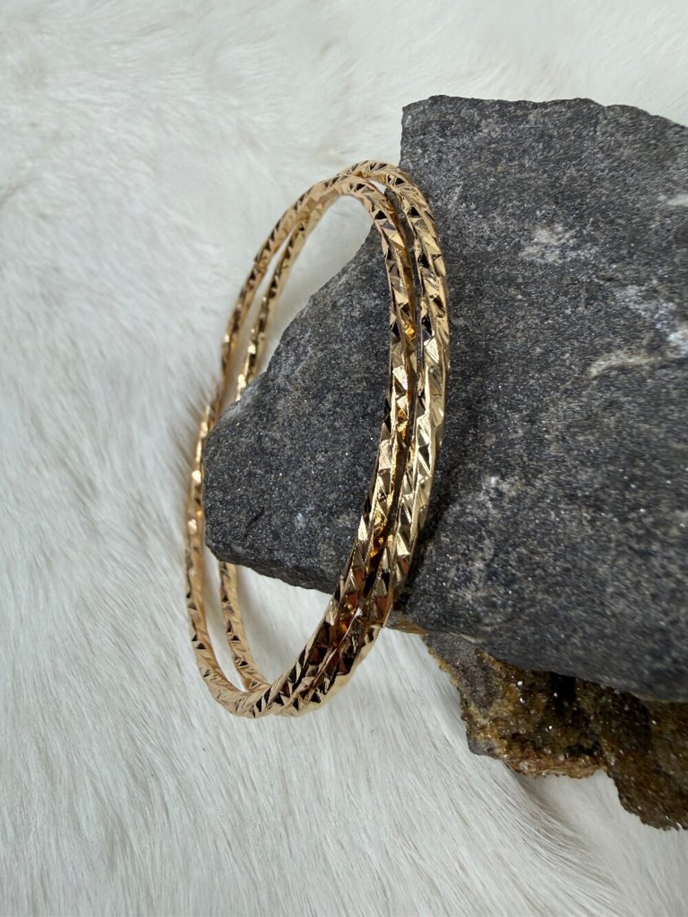 Pair of Twisted Gold Tone Bangle Bracelets 8.25"